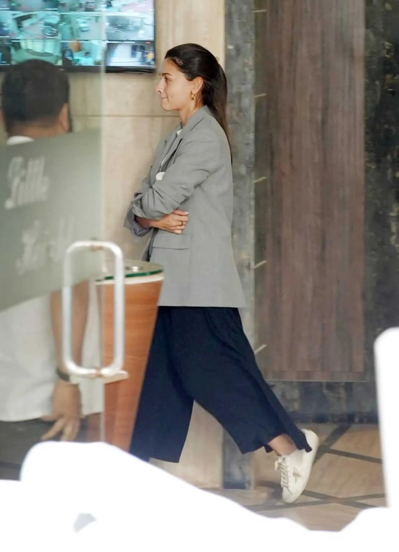 Alia Bhatt was spotted wearing a grey blazer over black relaxed pants in the city as she avoided the paps.